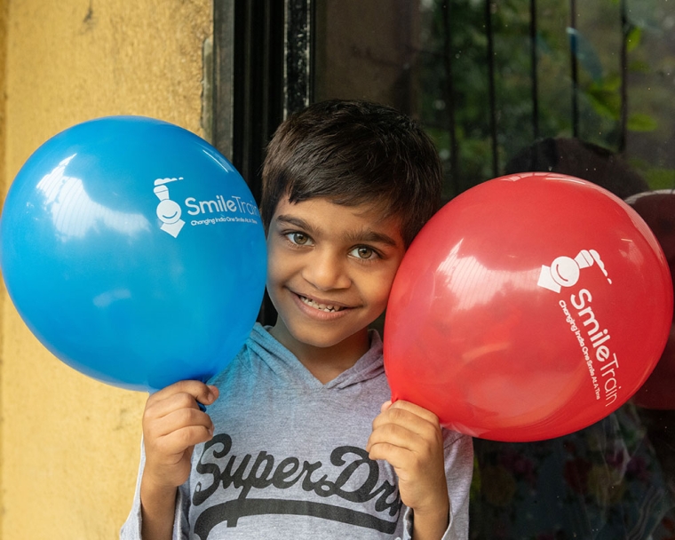 Samrat smiling with balloons